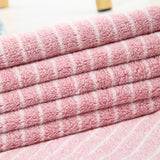 Warp-knitted water pattern coral velvet towel, factory wholesale.